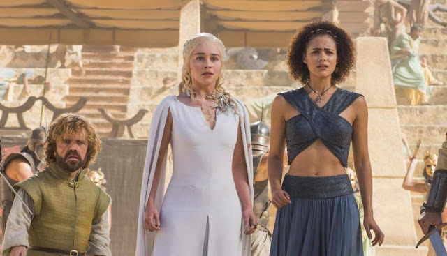 Peter Dinklage, Emilia Clarke, and Nathalie Emmanuel in "Game of Thrones"