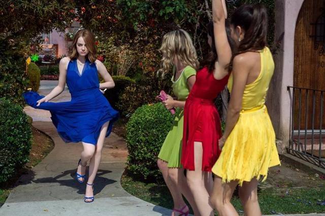 Emma Stone shows off the dazzling wardrobe of "La La Land"