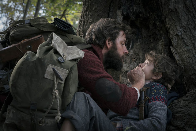 John Krasinski and Noah Jupe in "A Quiet Place"