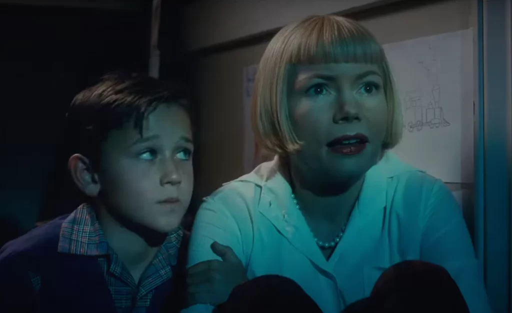 Mateo Zoryon Francis-DeFord and Michelle Williams in The Fabelmans