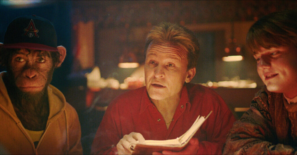 A scene from Better Man with Damon Herriman