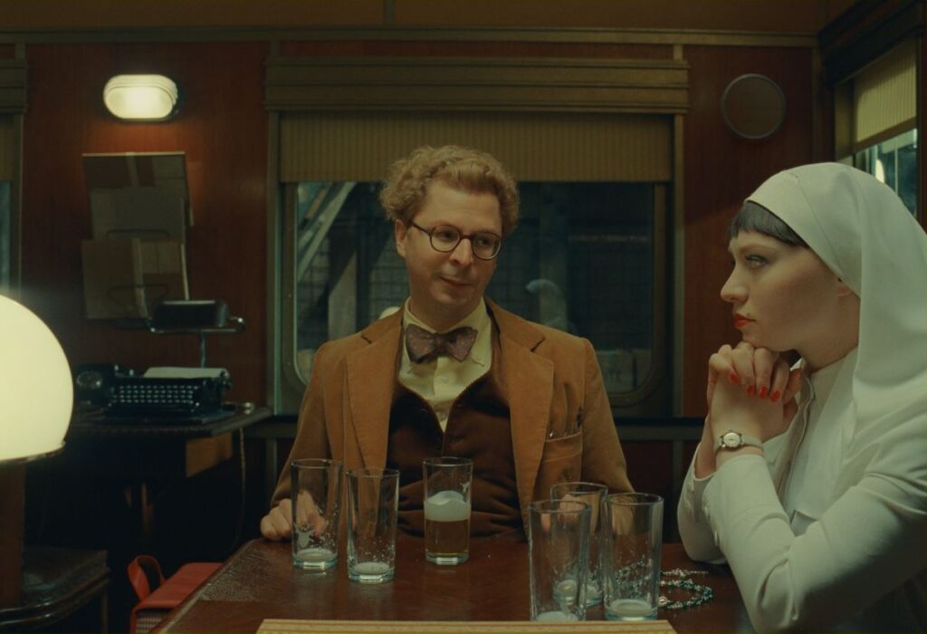 Michael Cera and Mia Threapleton in The Phoenician Scheme