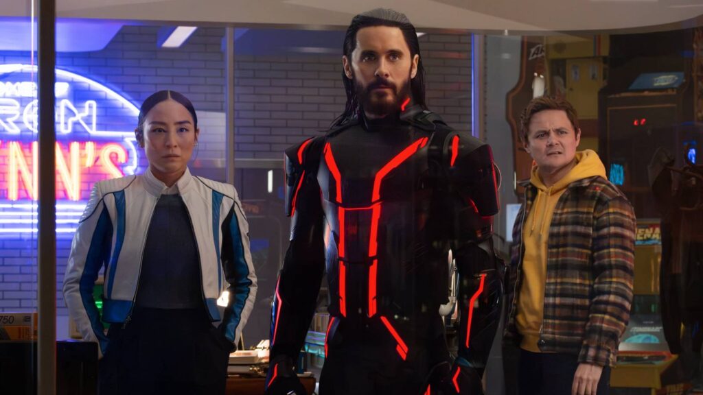 Greta Lee, Jared Leto, and Arturo Castro in Tron: Ares