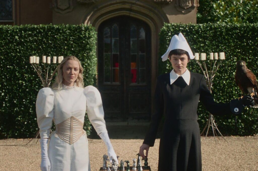 Maika Monroe and Emma Corrin in 100 Nights of Hero