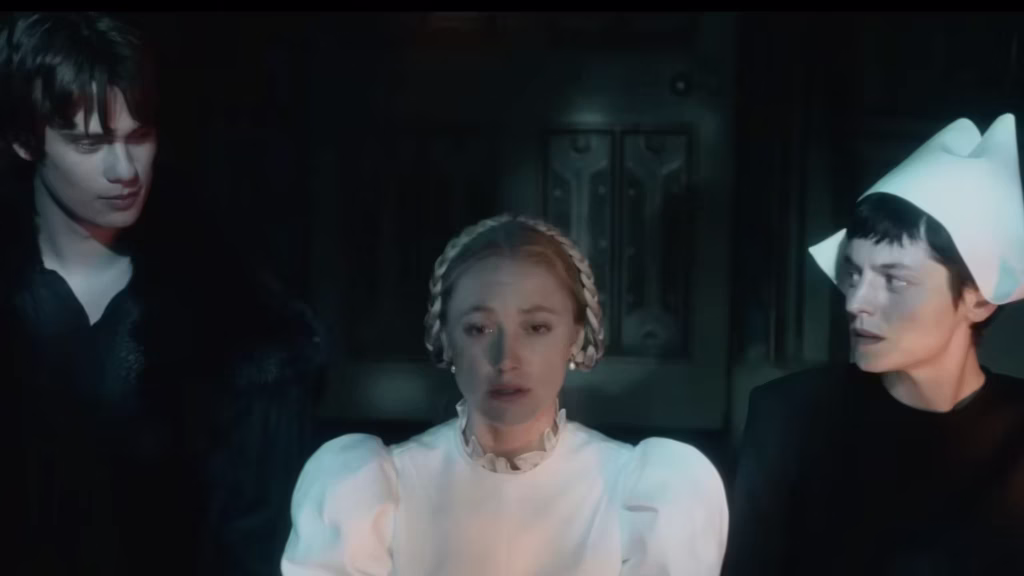 Nicholas Galitzine, Maika Monroe, and Emma Corrin in 100 Nights of Hero