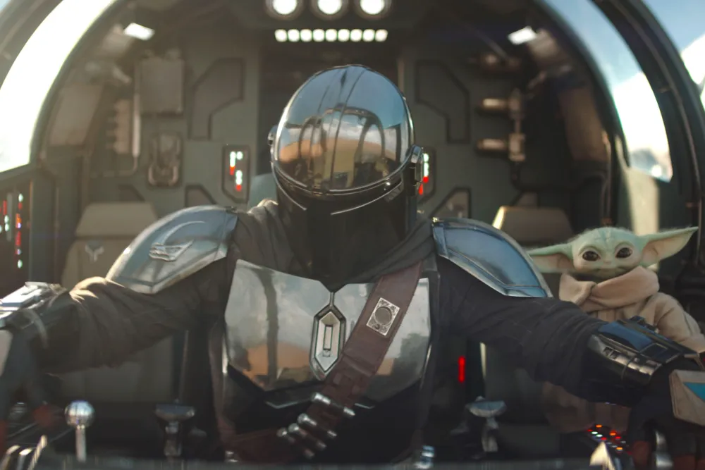 A scene from The Mandalorian and Grogu, featuring both title characters