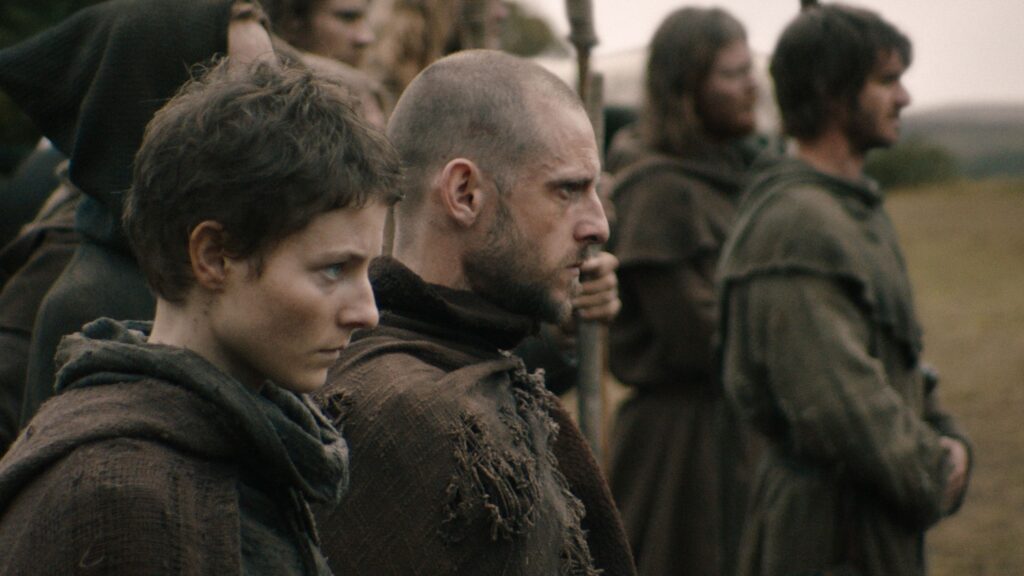 Thomasin McKenzie and Jamie Bell in The Uprising